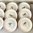 Lot de 12 assiettes en porcelaine Bernardaud "Les oiseaux d'or"