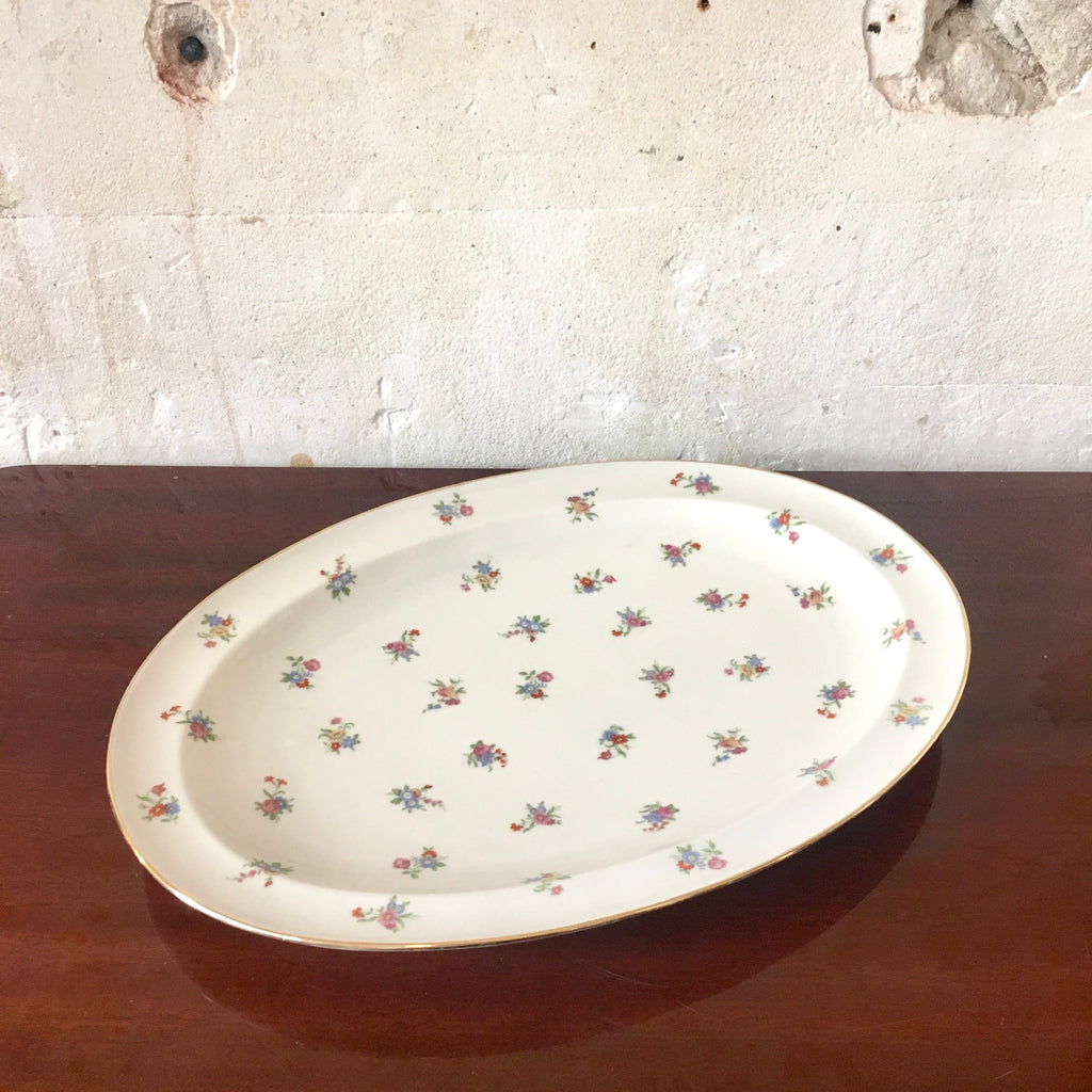 Plat ovale en porcelaine de Limoges décor fleurs