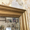 Miroir rectangulaire cadre en bois doré et plâtre