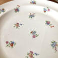Assiette plate en porcelaine de Limoges décor fleurs