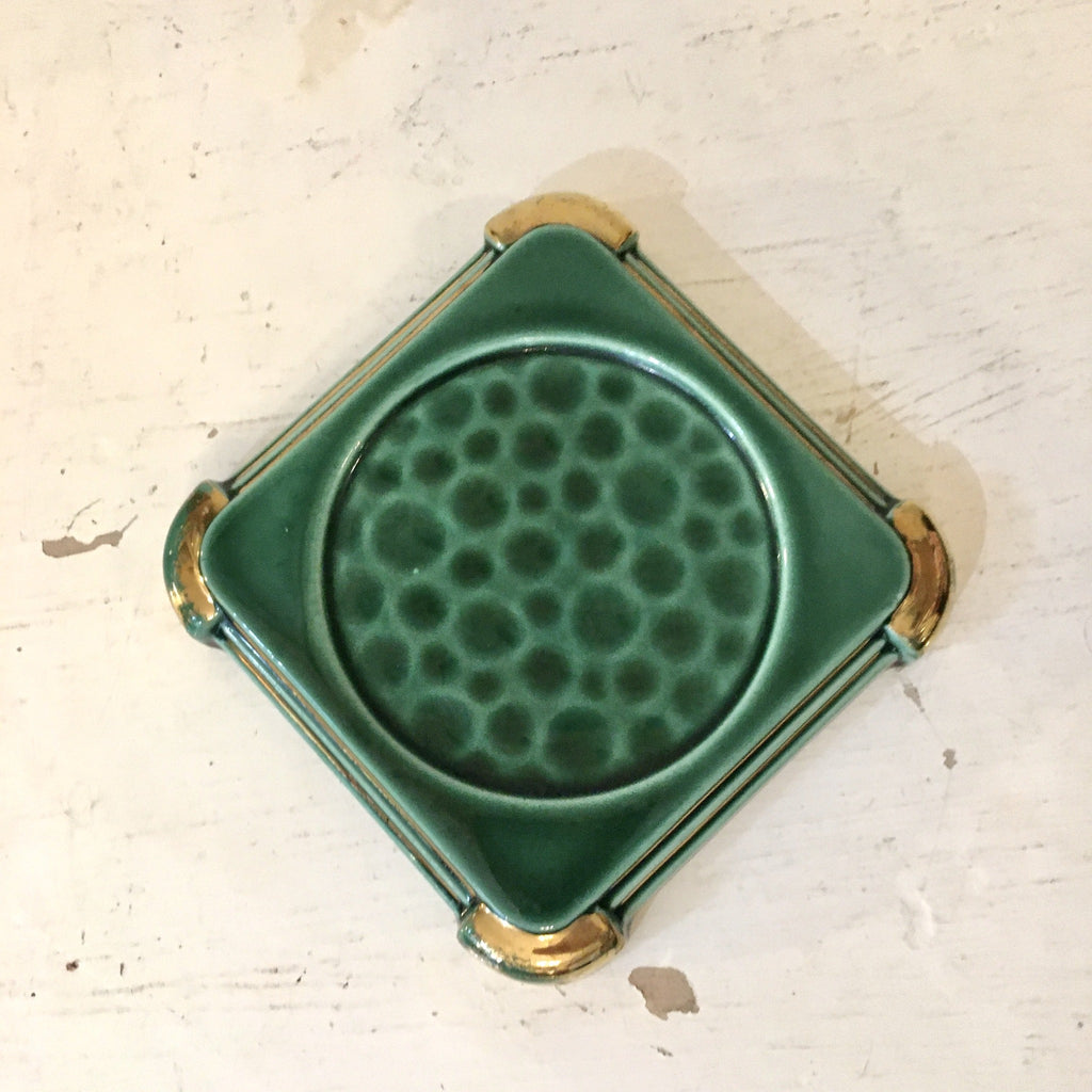 Dessous de bouteille en faïence vert foncé