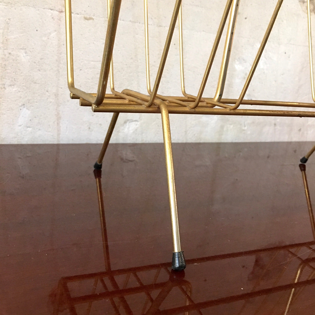 Porte-revues en métal doré