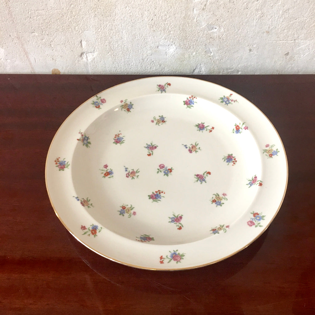 Plat rond en porcelaine de Limoges décor fleurs