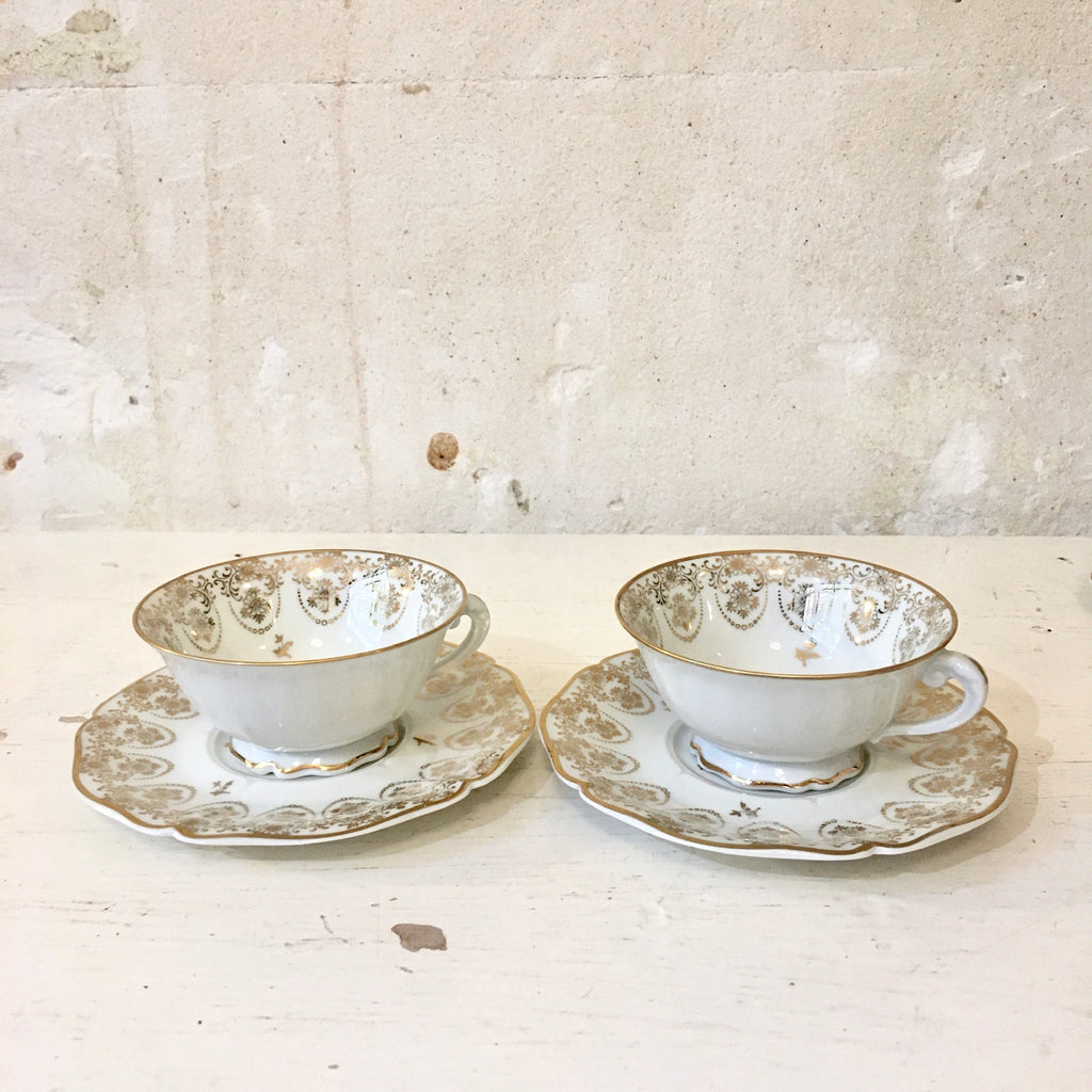 Ensemble de 2 tasses et sous-tasses porcelaine de Limoges blanc et doré