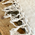 Serviette ancienne en coton à franges