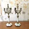 Paire de chandeliers en marbre, bronze et laiton style Louis XVI
