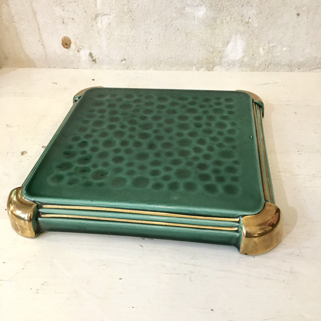 Dessous de plat en faïence vert foncé