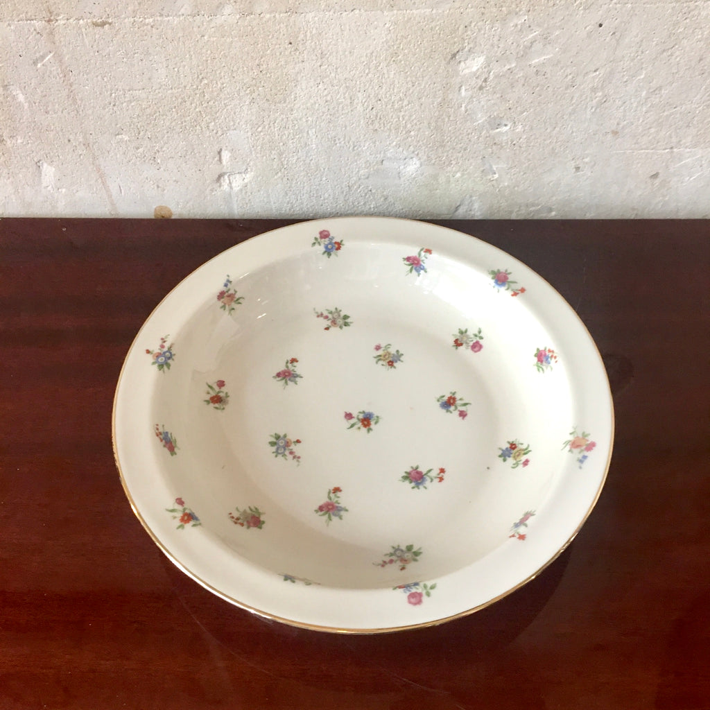 Plat rond en porcelaine de Limoges décor fleurs