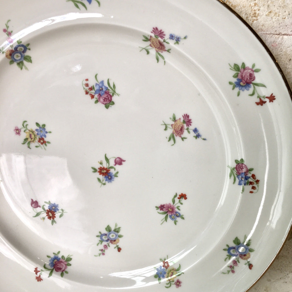 Assiette à dessert en porcelaine de Limoges décor fleurs