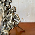 Miroir à poser rocaille en régule argenté décor angelots