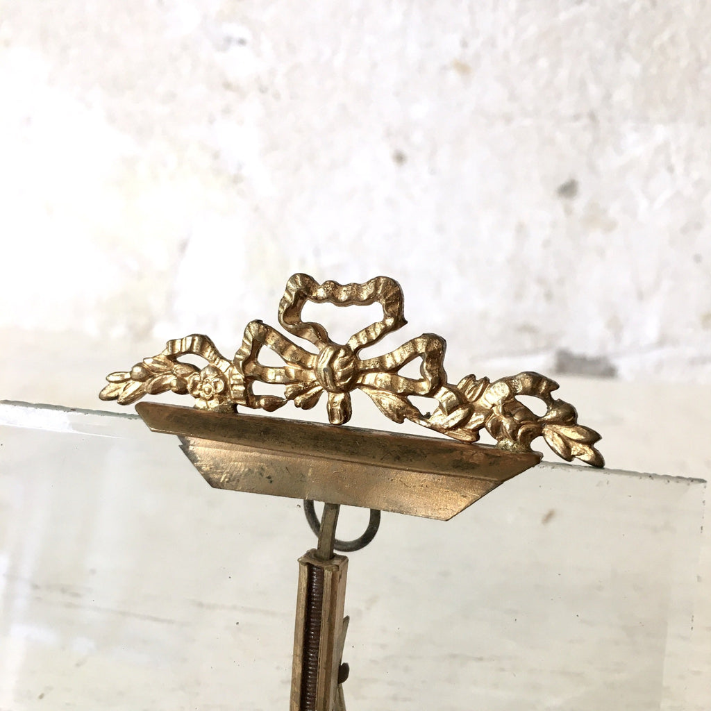 Petit cadre photo en laiton décor nœud style Louis XVI