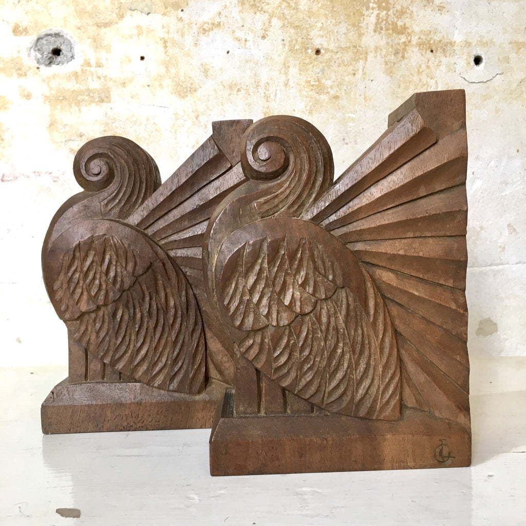 Paire de serre-livres en bois sculpté Art Déco