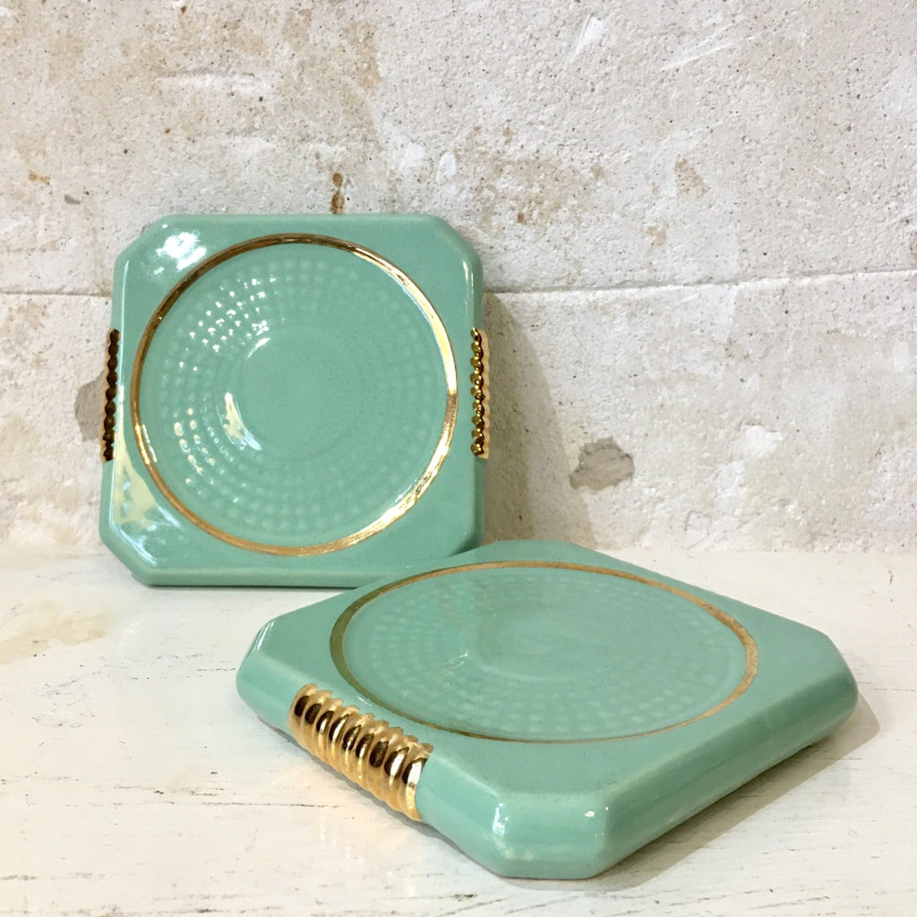 Dessous de bouteille vert menthe et doré en céramique émaillée