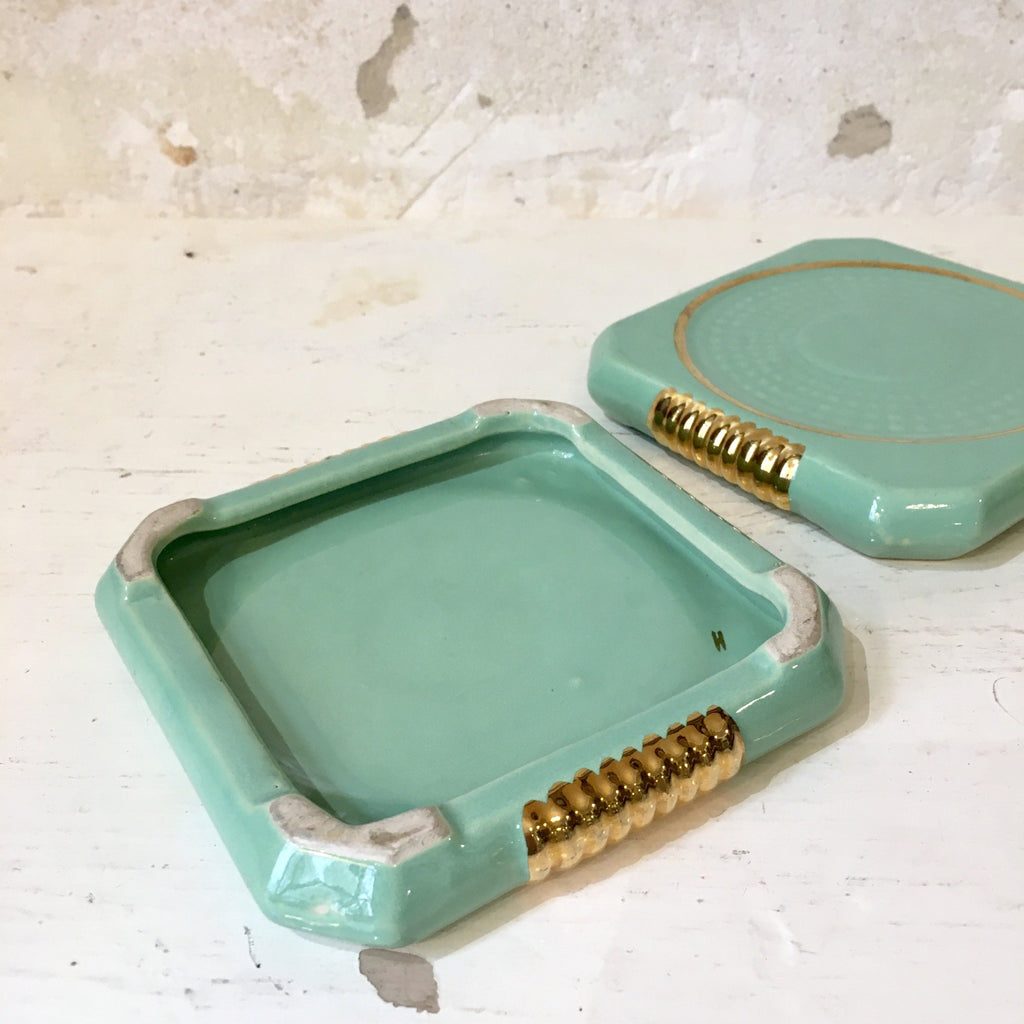 Dessous de bouteille vert menthe et doré en céramique émaillée