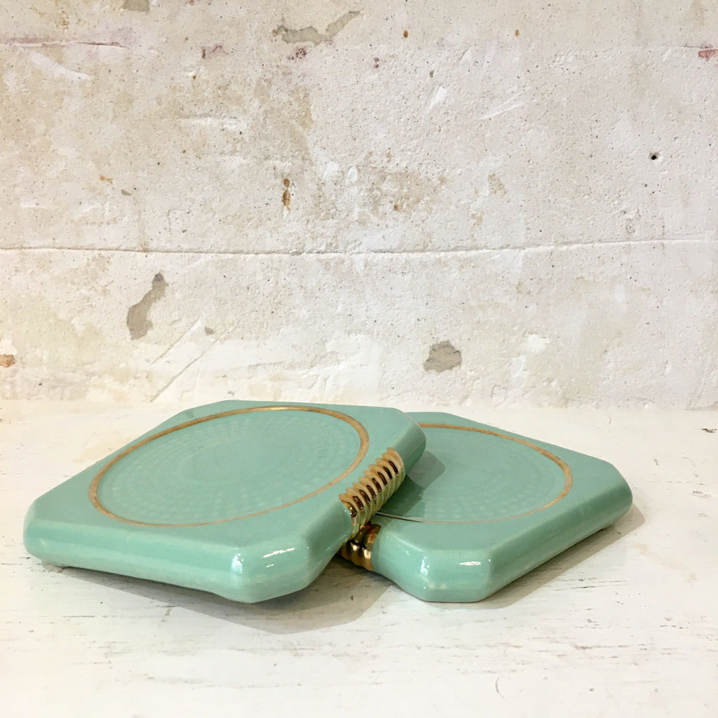 Dessous de bouteille vert menthe et doré en céramique émaillée