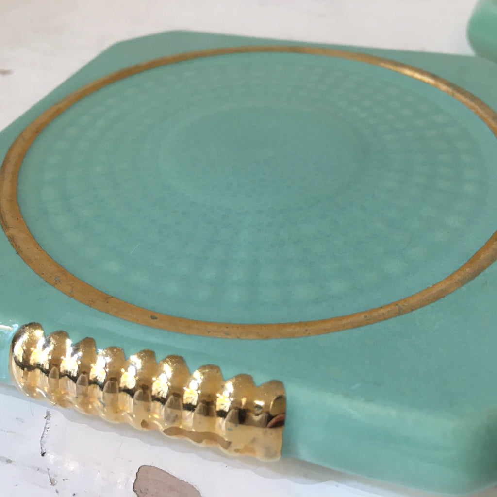 Dessous de bouteille vert menthe et doré en céramique émaillée