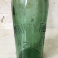 Ancienne bouteille de bière verte en verre