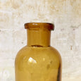 Ancien flacon de pharmacie en verre ambré