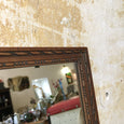 Petit miroir rectangulaire en bois sculpté 29 x 37 cm