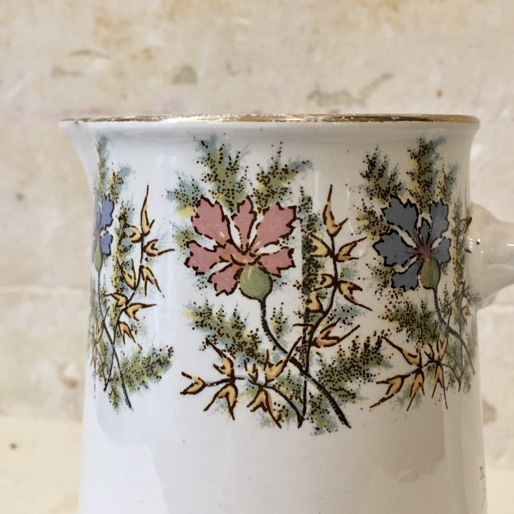 Pichet en céramique de Sarreguemines décor fleurs multicolores