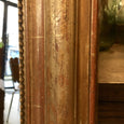 Grand miroir Louis Philippe doré fleurs gravées