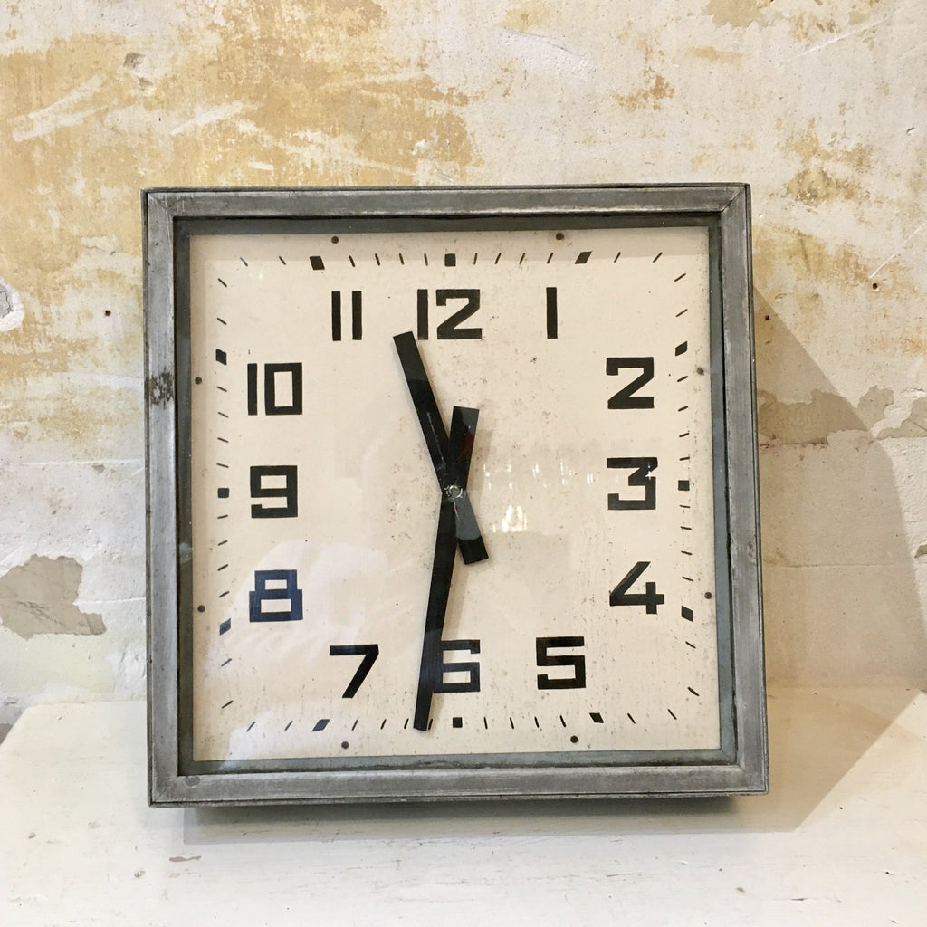 Horloge carrée double face industrielle